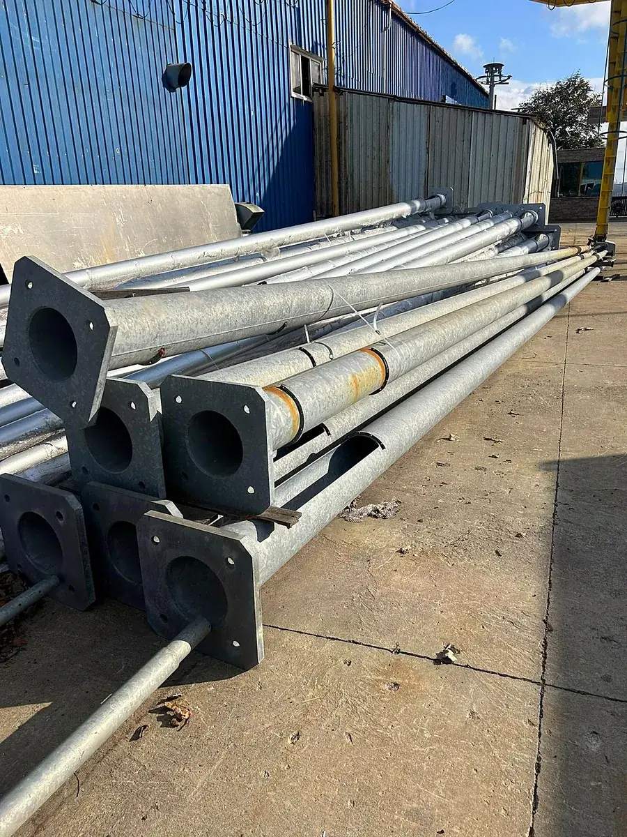 Hot-dip galvanized steel lighting poles to EN ISO 1461 with flange base plates and door apertures